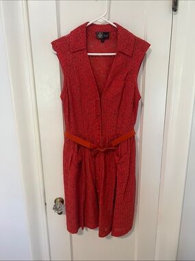 Red Lace Sleeveless Dress with two front pockets - and sewn in slip and belt.